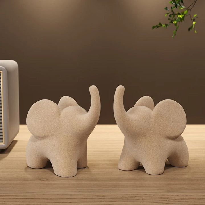 contemporary Resin Elephant Figurine With Uplifted Trunk