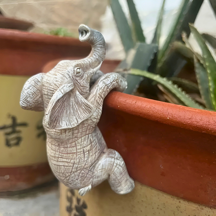 Whimsical Textured Elephant Climbing Sculpture