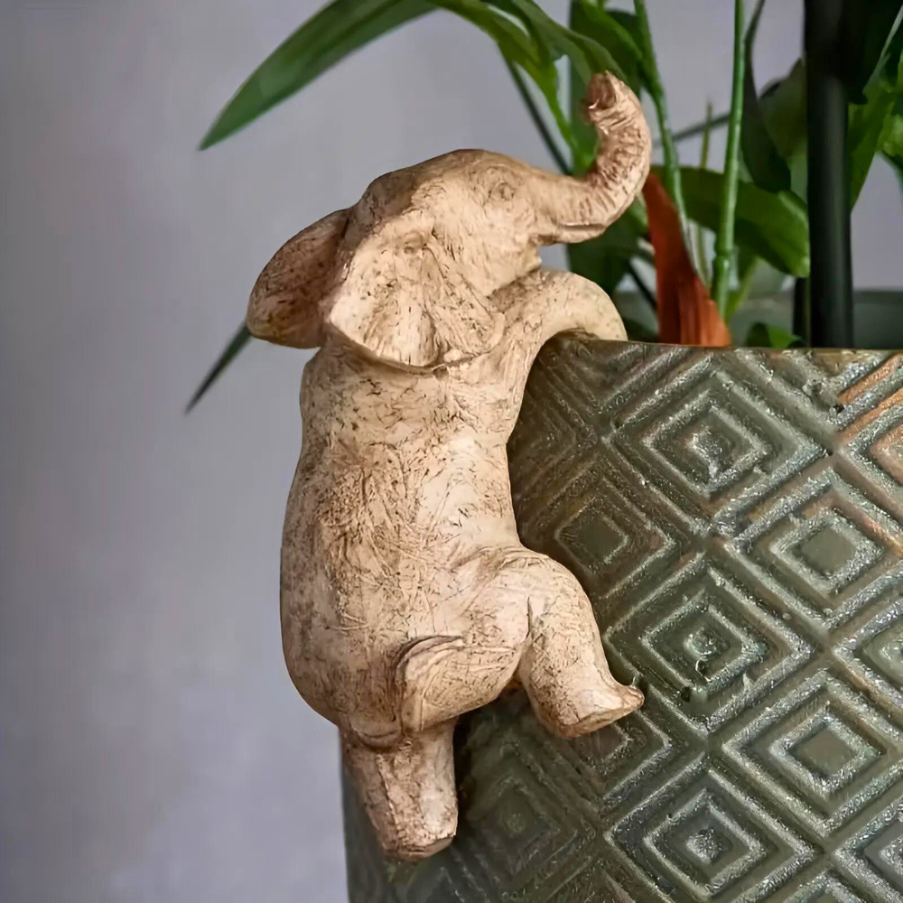 Whimsical Textured Elephant Climbing Sculpture