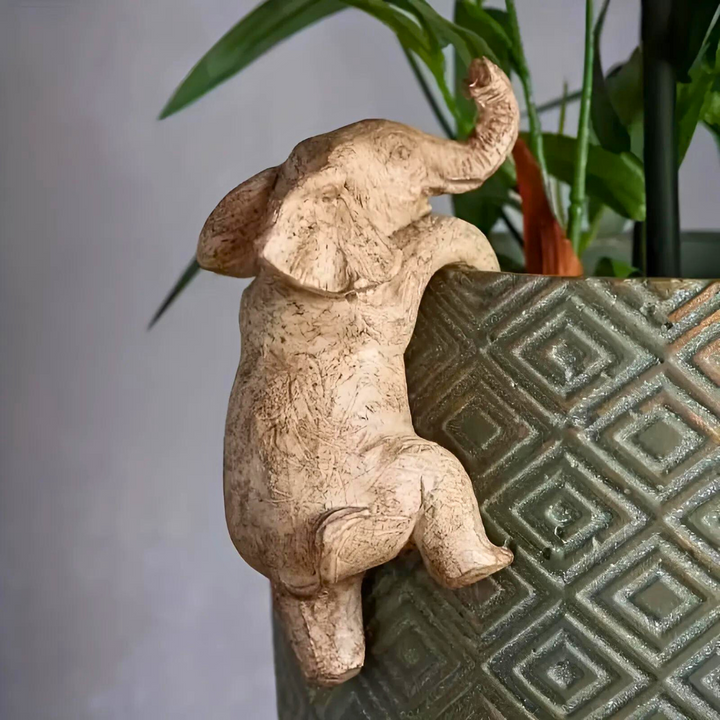 Whimsical Textured Elephant Climbing Sculpture