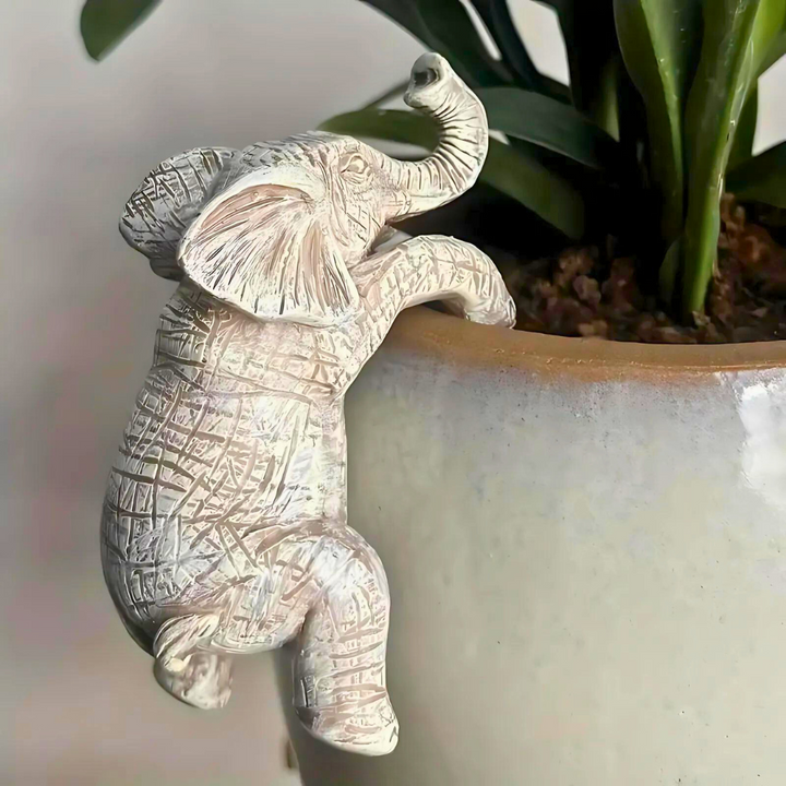 Whimsical Textured Elephant Climbing Sculpture